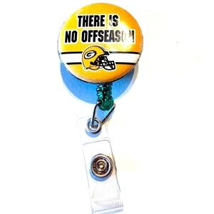 Retractable badge holder